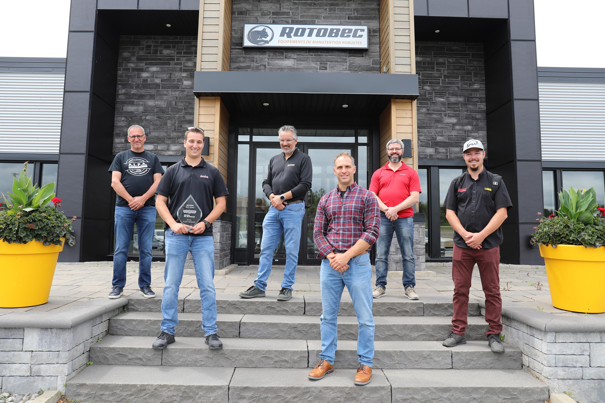 The Rotobec team in front of their office.