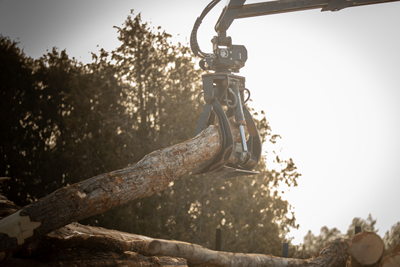 loader lifting logs