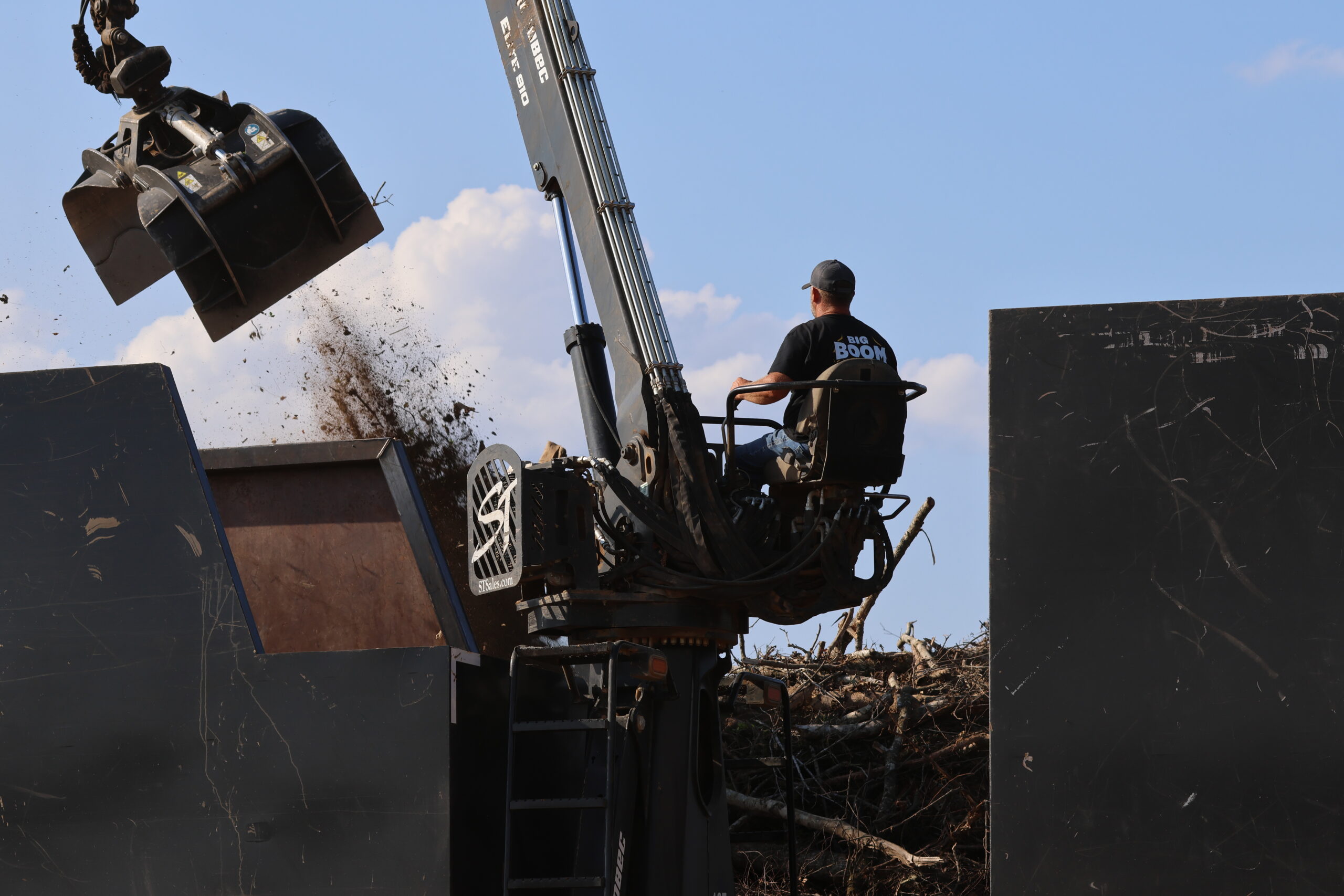 man operating elite in refuse